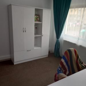 Giường trong phòng chung tại GARSONIERA ARA