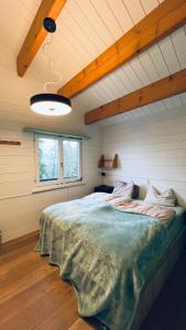 Postel nebo postele na pokoji v ubytování Chalet Tännli - CharmingStay