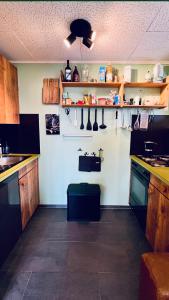 Kuchyň nebo kuchyňský kout v ubytování Chalet Tännli - CharmingStay
