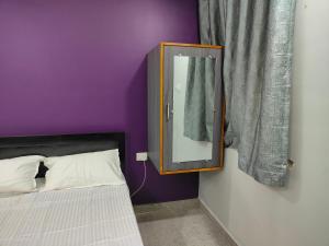 Postel nebo postele na pokoji v ubytování Sadafuli Guest House Assagao
