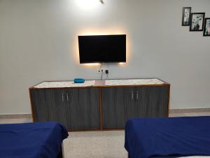 TV a/nebo společenská místnost v ubytování Sadafuli Guest House Assagao