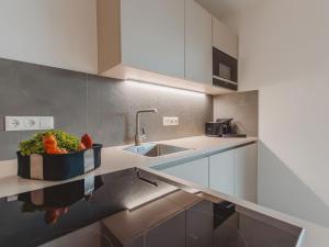 Kuchyňa alebo kuchynka v ubytovaní Apartment Das Georgen- Maiskogel by Interhome