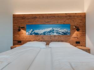 Posteľ alebo postele v izbe v ubytovaní Apartment Das Georgen- Maiskogel by Interhome