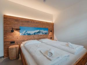 Posteľ alebo postele v izbe v ubytovaní Apartment Das Georgen- Maiskogel by Interhome