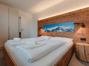 Posteľ alebo postele v izbe v ubytovaní Apartment Das Georgen- Maiskogel by Interhome