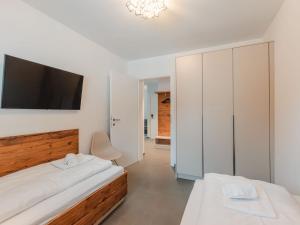 Posteľ alebo postele v izbe v ubytovaní Apartment Das Georgen- Maiskogel by Interhome