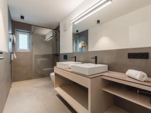 Kúpeľňa v ubytovaní Apartment Das Georgen- Maiskogel by Interhome