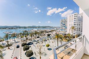 an apartment balcony with a view of a marina at Hotel Sa Clau by Mambo in San Antonio