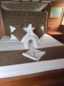 Łóżko lub łóżka w pokoju w obiekcie Leopard Nest - Glamping in Yala