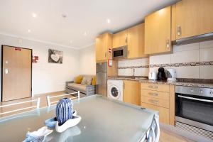 Kuchyň nebo kuchyňský kout v ubytování Clube Praia da Rocha 3 + 13 fotografií