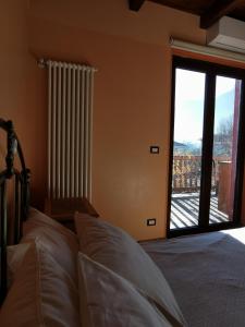 Postel nebo postele na pokoji v ubytování Adagio Guesthouse