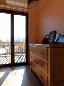 TV a/nebo společenská místnost v ubytování Adagio Guesthouse