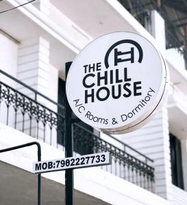 a sign for the chill house in front of a building at The Chill House in Cochin