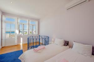 Postel nebo postele na pokoji v ubytování Casa Verde Ayamonte