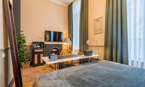 TV a/nebo společenská místnost v ubytování Communal Hotel Kutaisi