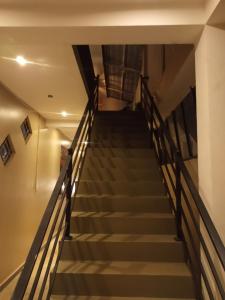 a flight of stairs in a building at KUMA'S HOTEL in Weligama