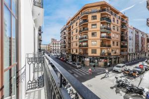 a view of a city street with buildings and cars at Amazinn Places EVI Apartments in Valencia