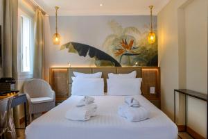 Postel nebo postele na pokoji v ubytování Best Western Premier Montfleuri