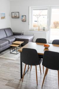 Χώρος καθιστικού στο Ferienwohnung Tide 21 +33 φωτογραφίες