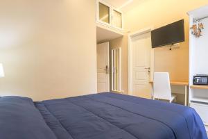 TV tai viihdekeskus majoituspaikassa Binario Zero