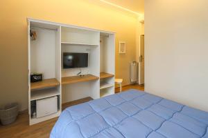 Vuode tai vuoteita majoituspaikassa Binario Zero 26 kuvaa lisää