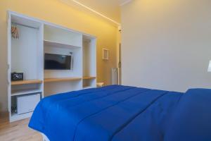 TV tai viihdekeskus majoituspaikassa Binario Zero