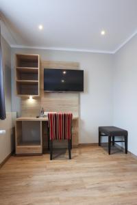 TV a/nebo společenská místnost v ubytování Arthotel ANA Flair