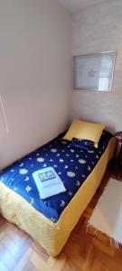 Ein Bett oder Betten in einem Zimmer der Unterkunft Casa da Cris Quiron