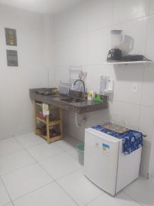 A kitchen or kitchenette at Kitnet Aconchegante próx. ao centro da Cidade(102)