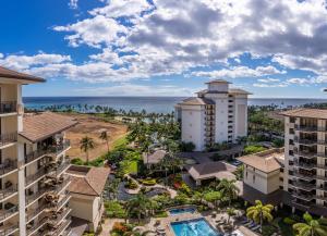 an aerial view of the resort buildings and the ocean at Ko Olina Beach Villas O505 in Kapolei