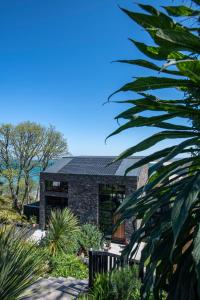 a house with a solar roof on top of it at Chy conary in Carbis Bay