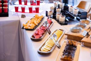 a buffet of different types of food on a table at La Brisa Boutique Hotel in Dhërmi