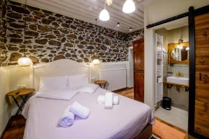 Postel nebo postele na pokoji v ubytování Agios Germanos