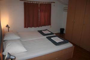 Voodi või voodid majutusasutuse Guesthouse Jelić toas