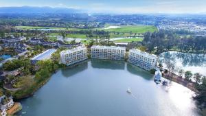 an aerial view of a resort on a river at Luxury apartments in the Laguna near the lake in Bang Tao Beach