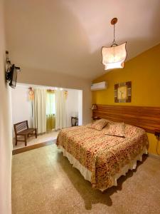 Postel nebo postele na pokoji v ubytování Hotel Complejo Najul Suites-Solo Adultos