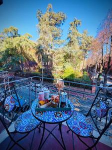 a tray of food sitting on a table on a patio at Sant'Orsola Lodge Bologna in Bologna