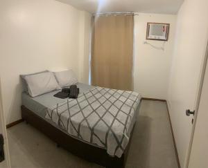 Ένα ή περισσότερα κρεβάτια σε δωμάτιο στο Apartamento completo 203