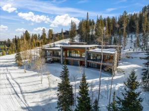 an aerial view of a house in the snow at Quicksilver Haus in Park City