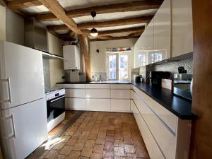 Kuchyň nebo kuchyňský kout v ubytování La Casa Duplex