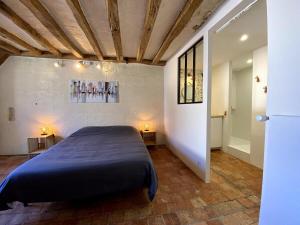 Postel nebo postele na pokoji v ubytování La Casa Duplex