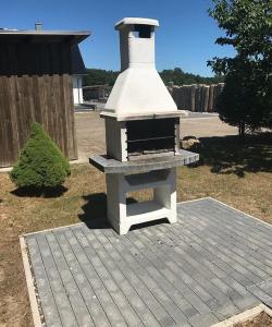 a brick oven sitting on top of a patio at Feldstrasse 3 b in Zempin