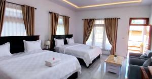 Juma cottages客房内的一张或多张床位
