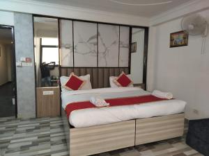 Postel nebo postele na pokoji v ubytování Hotel Clink New Delhi Airport
