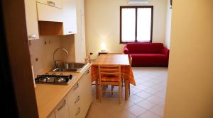Kuchyň nebo kuchyňský kout v ubytování Gli Angeli Agriturismo - Zio Antonio + 7 fotografií
