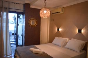 Postel nebo postele na pokoji v ubytování Hotel Pousada Azzurra