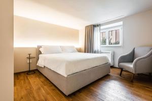 Ένα ή περισσότερα κρεβάτια σε δωμάτιο στο Ferrini Home - Firenze 70