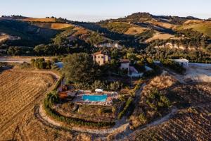 an aerial view of a house on a hill at Agricola La Casetta in Montefiore dellʼAso