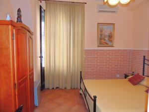 Postel nebo postele na pokoji v ubytování B&B I Mastrazzi Riposto Giarre