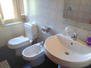 Koupelna v ubytování Albergo Villa Sorriso